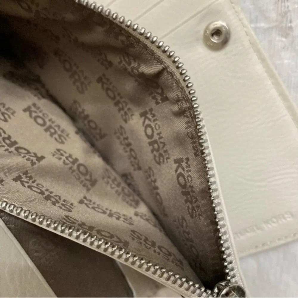 Michael Kors creamy white leather micro studded wallet clutch